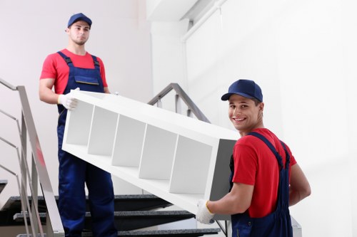 Careful wrapping and labelling of household items for relocation
