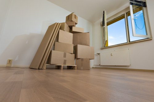 Furniture being carefully moved from a flat with stair access in Honor Oak