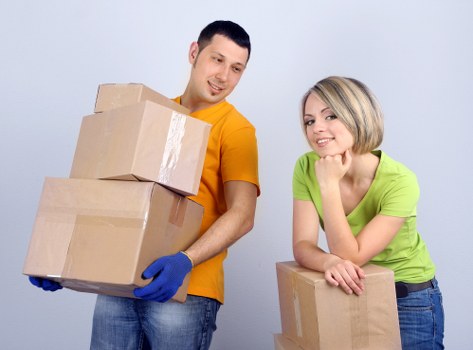 Loading household items into a van for an Honor Oak move