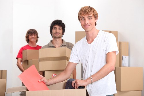 Packed office furniture and equipment ready for local relocation